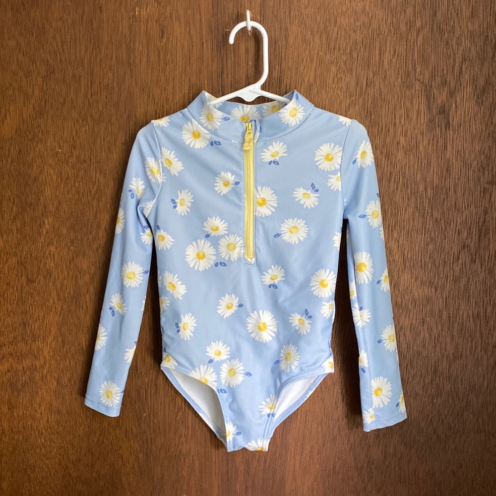 Light blue daisy print long sleeved one piece with zipper front, 4T